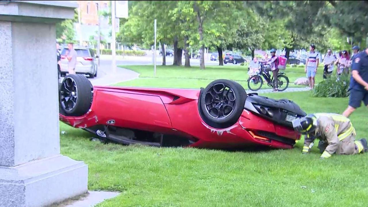Lamborghini flips over after colliding with truck downtown